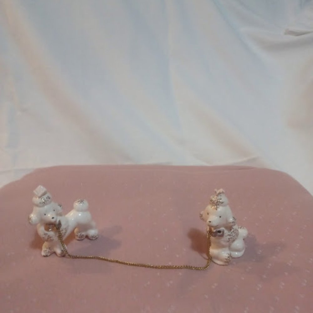 PORCELAIN POODLES